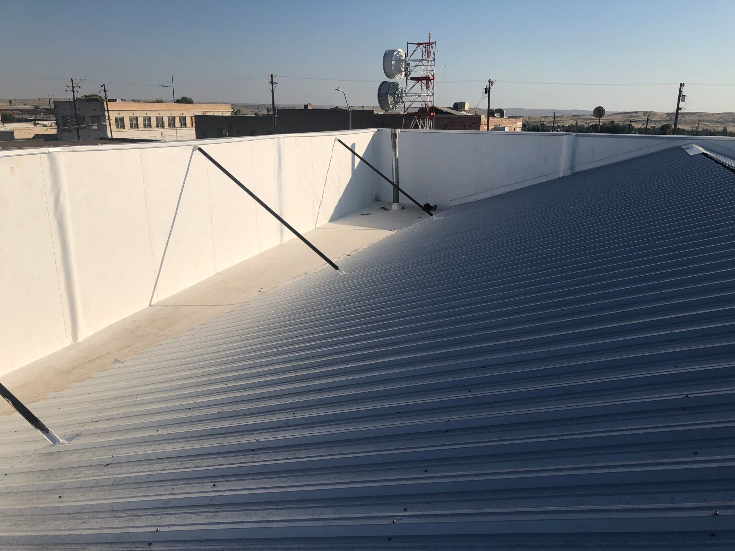 Restored metal roof and parapet in oil country