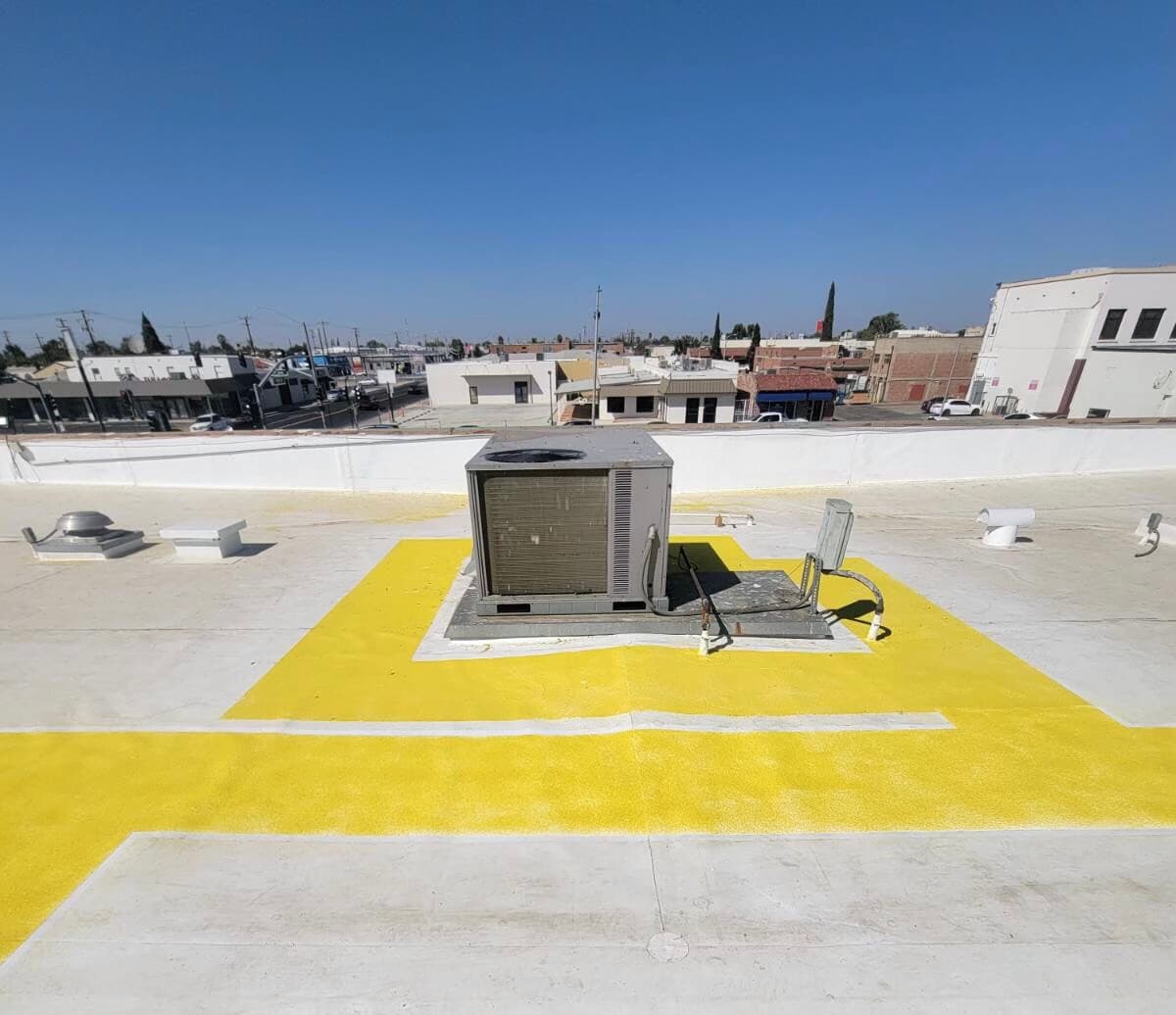 A cool roof with service walkways in the Delano area